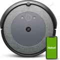 A roomba, a small circular robot that cleans up after lazy people.